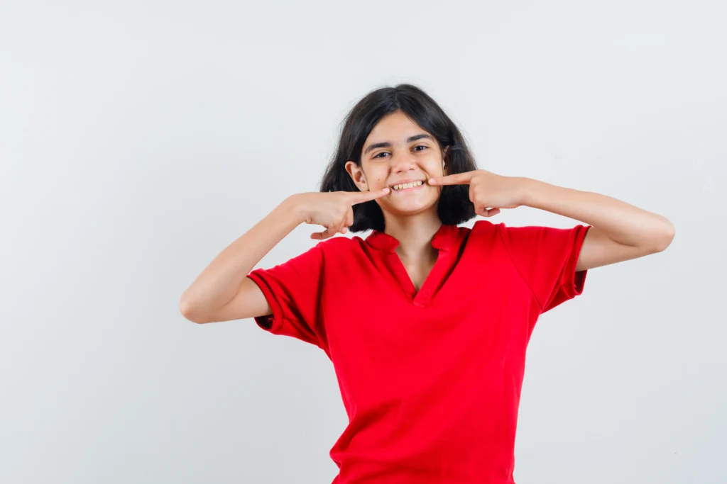 8 Summer Oral Health Tips to Keep Your Teeth Healthy 2 expressive young girl posing studio 1